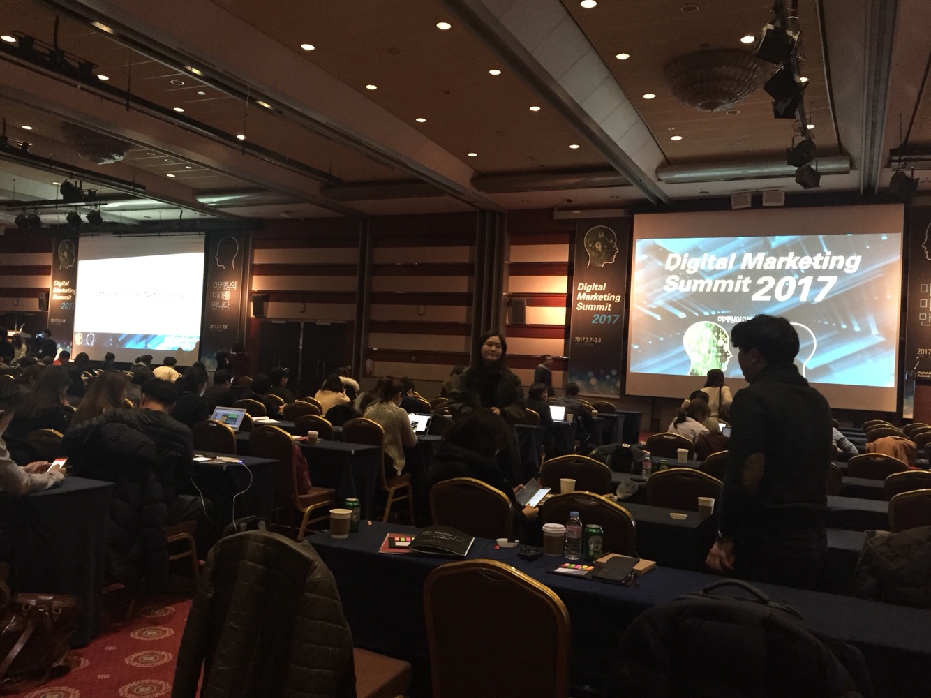 Digital Marketing Summit 2017 conference venue with attendees and presentation screens